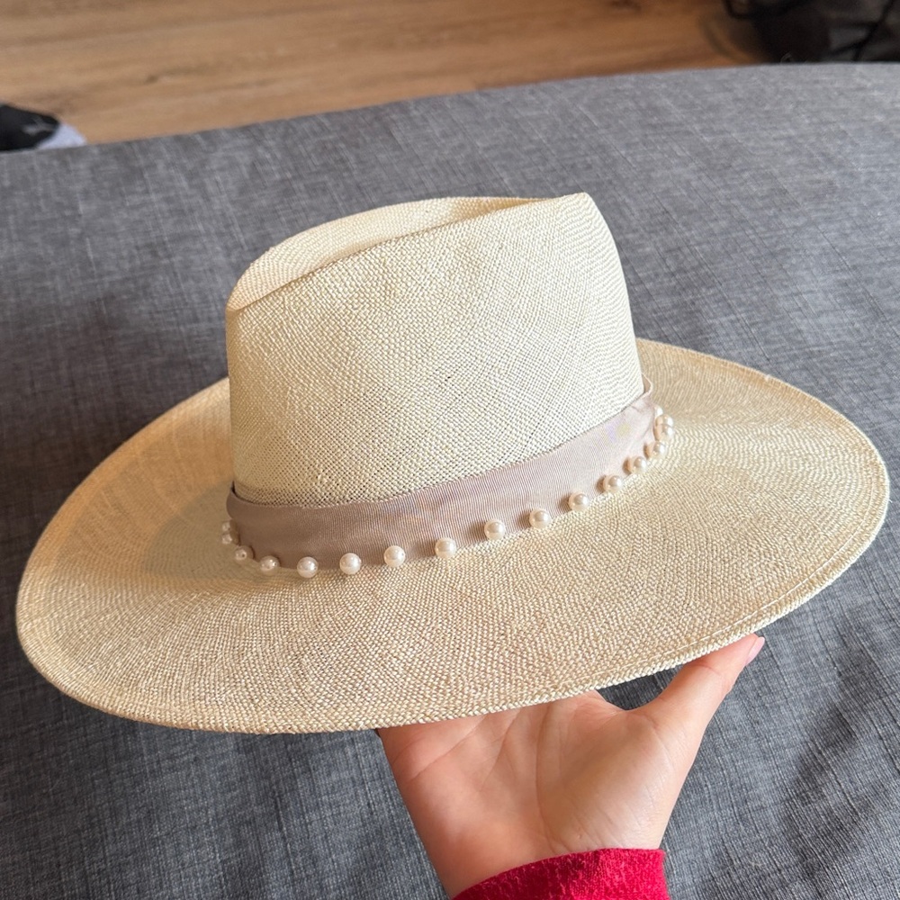 Eugenia Kim White and Tan Hat